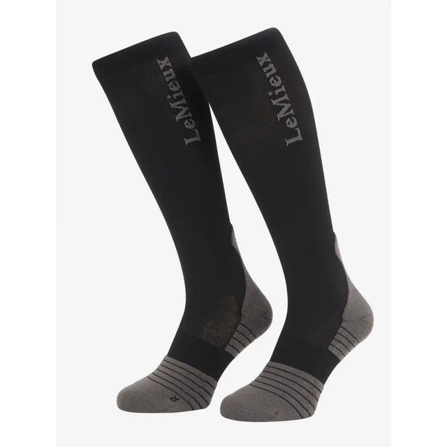Black lemieux performance sock with gray padded heel toe and side panels for all day comfort and support