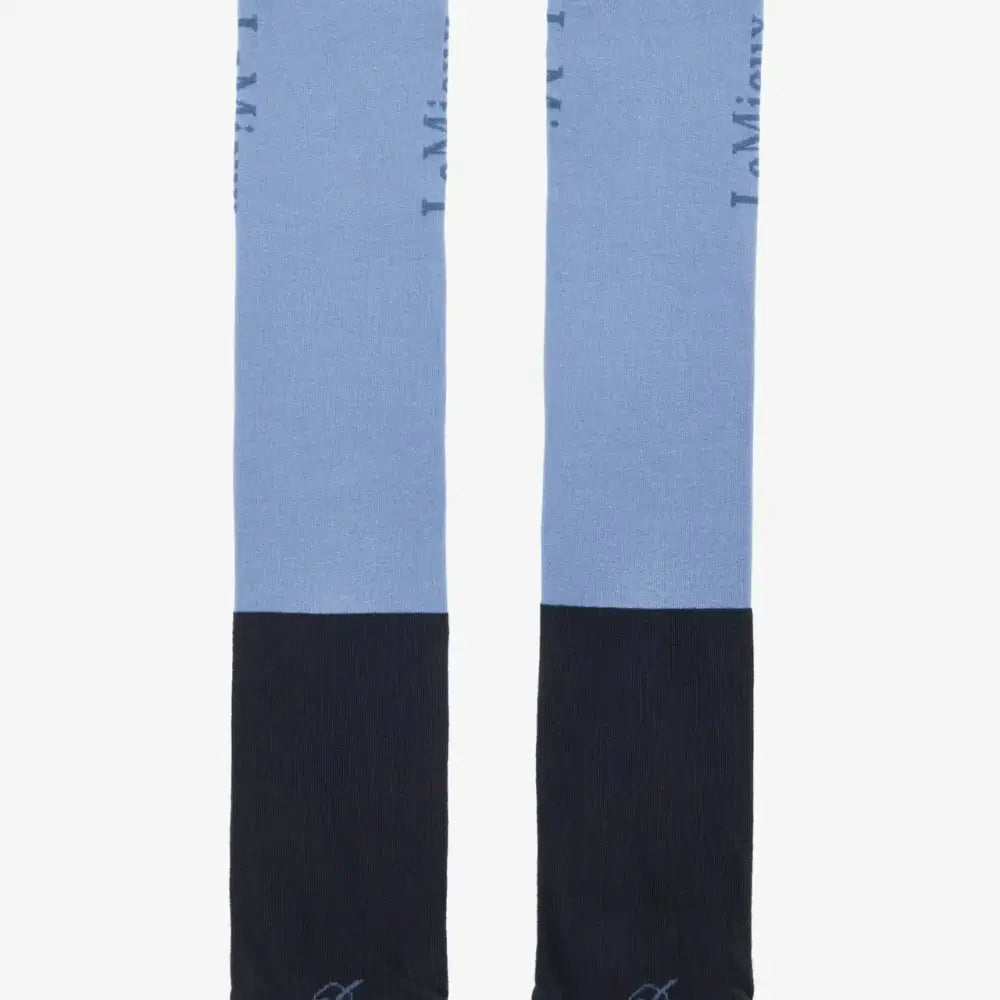 Lemieux performance socks powder blue in light blue and black with subtle l.miami logo on the upper leg section