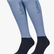Light blue and black knee-high lemieux performance socks with branding on the side perfect for sports use