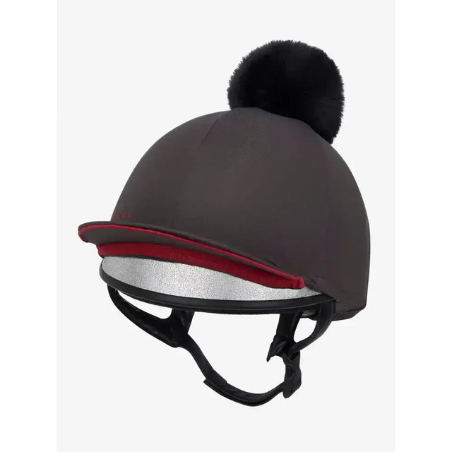 Gray lemieux pippa hat silk cinder with silky smooth four-way stretch, black faux fur pom pom, red trim, and silver lining