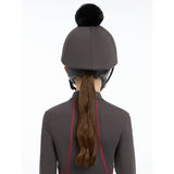 Gray lemieux pippa hat with black faux fur pom-pom made from silky smooth four-way stretch hat silk cinder material