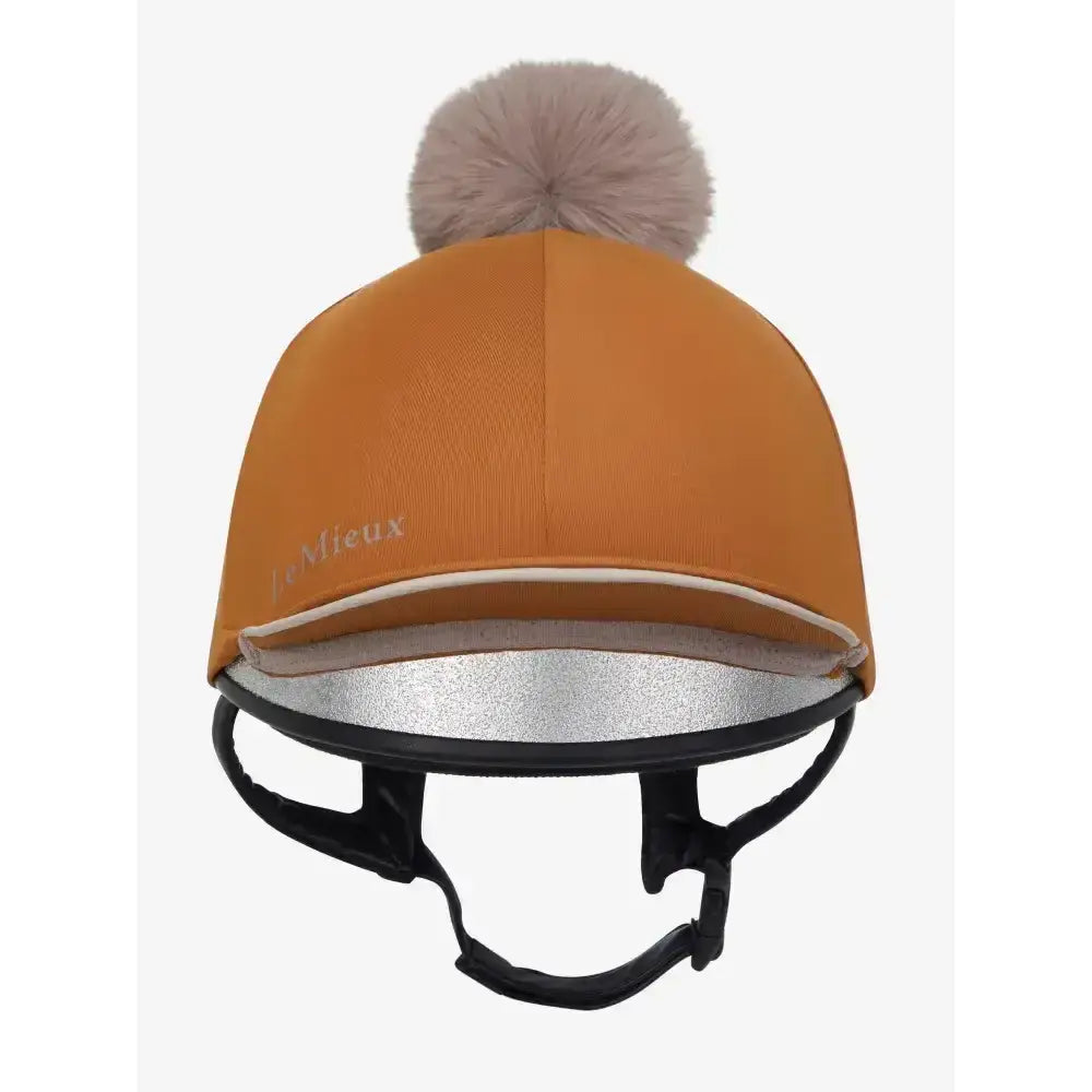 Orange lemieux pippa hat silk ginger with fluffy beige pom pom and black adjustable riding helmet cover straps