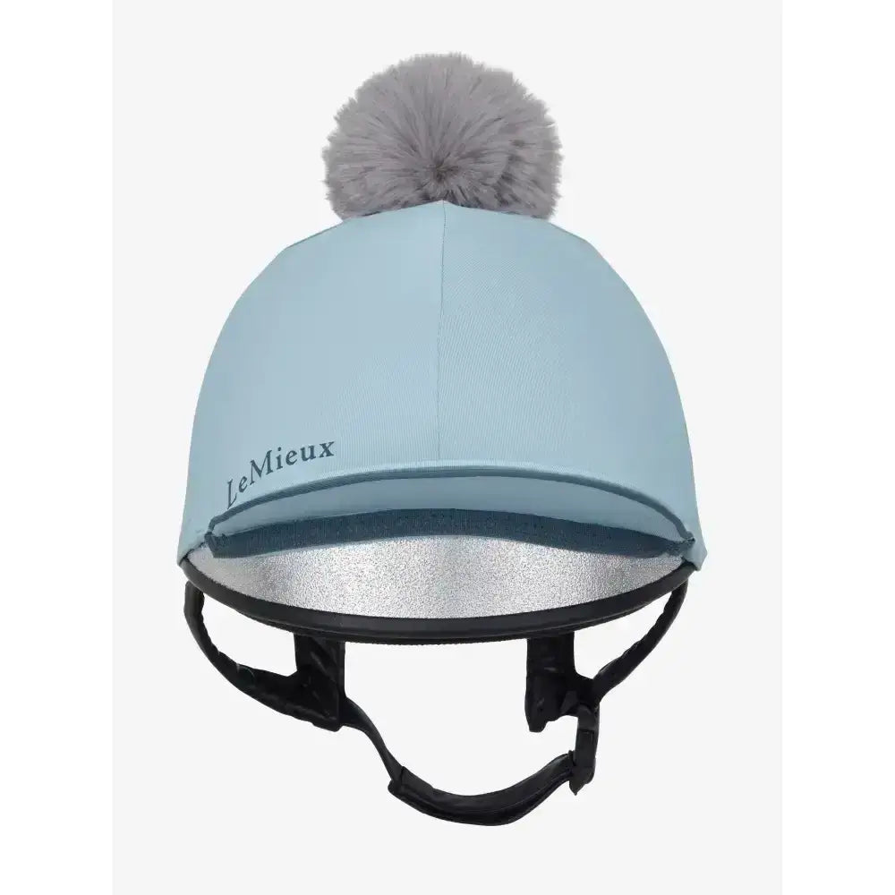 Light blue lemieux pippa hat silk equestrian helmet cover with gray faux fur pom-pom and silver reflective lining