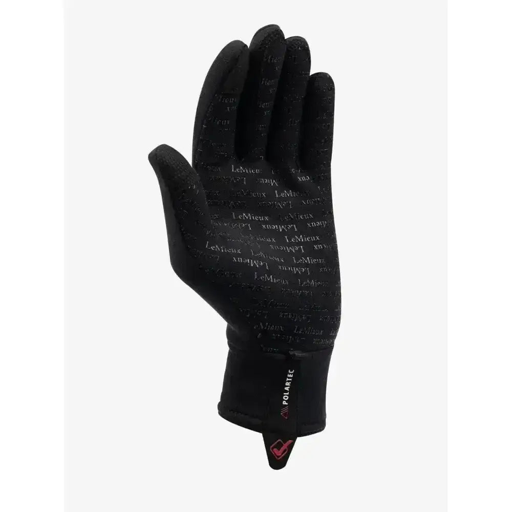 Black lemieux polartec gloves with textured surface and wrist strap shown from the back ideal winter riding glove