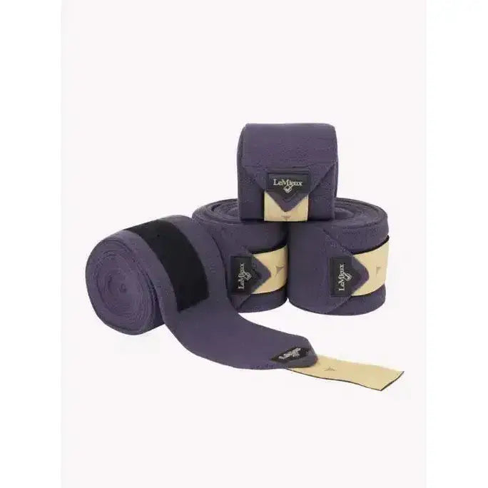 Purple lemieux polo bandages dusk show a black velcro strap and beige branding label in bandages dusk blue style
