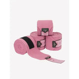 Pink lemieux polo bandages peony wrap with black elastic band and branded label for horse polo use