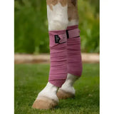 Pink woven lemieux polo bandages peony with black velcro strap and brand patch for horse legs protection