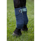 Navy blue fleece lemieux polo bandages with light teal strap and black leather brand patch in polo bandages petrol style