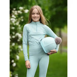 Light blue lemieux pom hat silk aqua lagoon with a fluffy gray pom-pom for equestrian style and safety