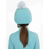 Light blue lemieux pom hat silk lagoon aqua equestrian helmet cover with fluffy white pom pom on top