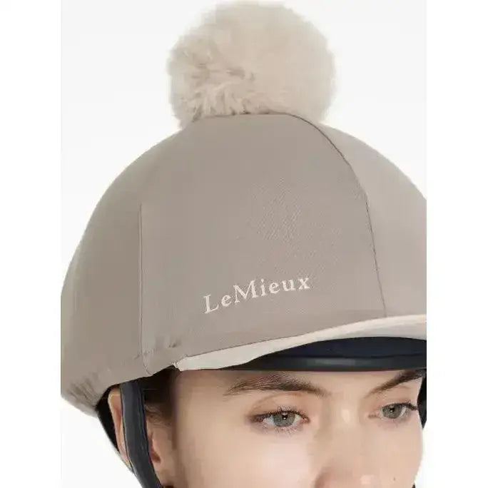 Beige lemieux pom hat silk pecan stone equestrian helmet cover with fluffy pom-pom on top