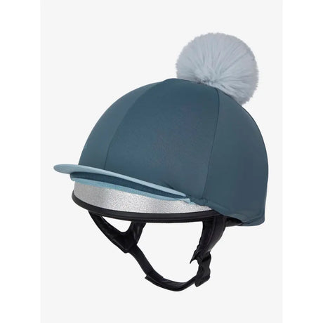 Teal lemieux pom hat silk petrol with silver glitter trim and fluffy white pom made from silky smooth four way fabric