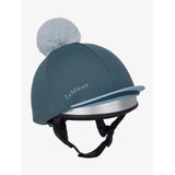 A lemieux pom hat silk petrol in teal with a silver reflective band and light gray pom-pom made from silky smooth four-way fabric
