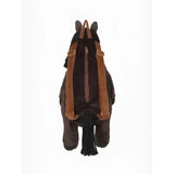 Dark brown plush lemieux pony bag freya with tan leather straps and black tassel shaped like a horse backpack