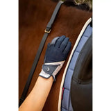 Back view of navy blue and gray lemieux pro mesh glove with white logo patch for close contact grip and comfort