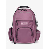 A mauve lemieux pro rucksack with black trim features multiple zippered compartments whip loop and riding hat holder