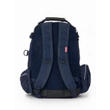 Back view of lemieux pro rucksack navy with mesh back panel, adjustable straps, and small red brand tag on right strap, must-have lemieux backpack