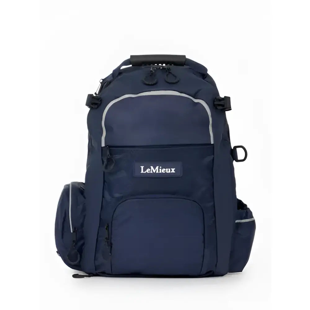 Dark navy blue lemieux pro rucksack with silver zipper pulls and reflective trim perfect for tuck away riding hat storage