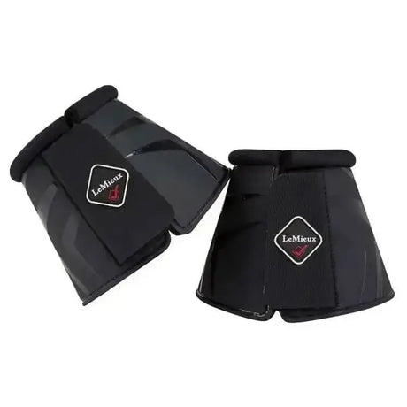 Black lemieux proshell over reach boots with a glossy finish and flexible design featuring a diamond logo
