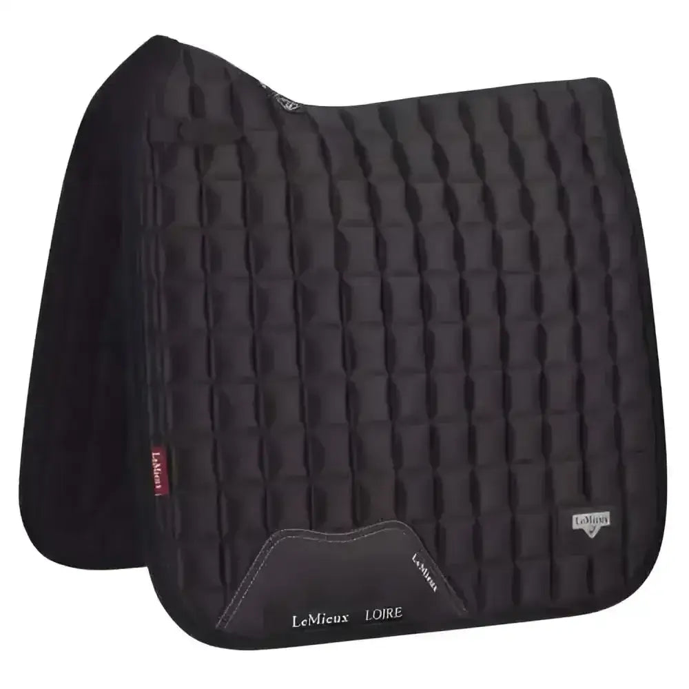 Black quilted lemieux prosport loire classic dressage pad with diamond pattern and stylish lemieux loire branding