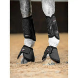 Black lemieux prosport proform ballistic over reach horse boots with breathable mesh and no-turn knob minimising design