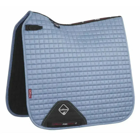 Light blue lemieux prosport suede dressage square with black trim and diamond logo patch for dressage use