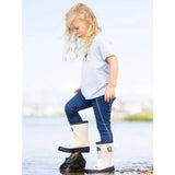 White rubber lemieux puddle pals kids welly palomino boots with black soles and buckle details for kids