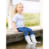 White rubber lemieux puddle pals kids welly sam boots with buckle strap and mud stains on the lower part