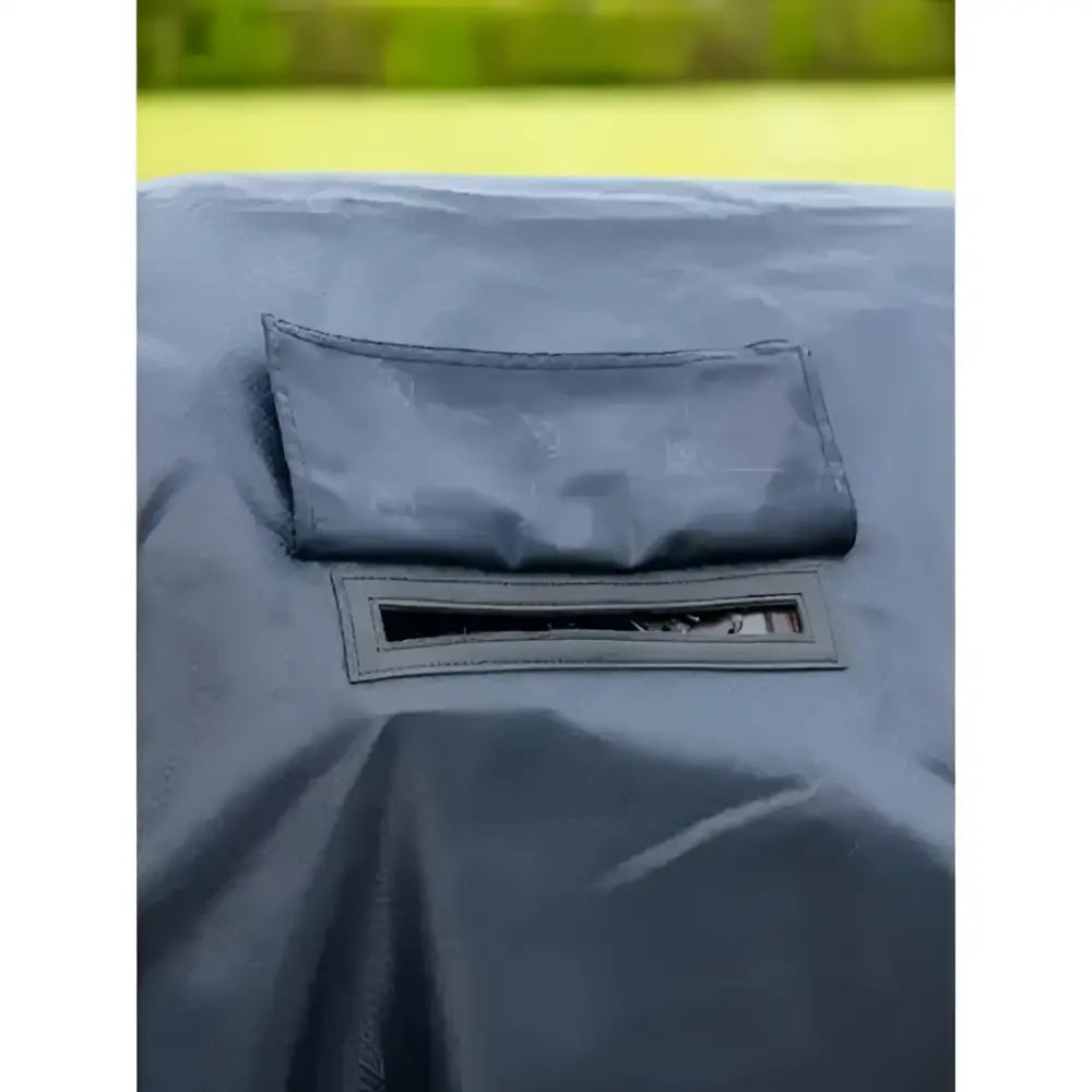 Dark gray fabric cover of lemieux rain sheet navy with rectangular zippered pocket and attached pouch visible