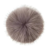 A plush round gray fox fur lemieux replacement pom perfect for refreshing your lemieux hat silks or replacement pom poms