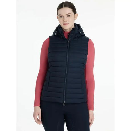 Navy blue quilted lemieux rose hooded puffer gilet with front zipper and snap buttons on hood for easy layering