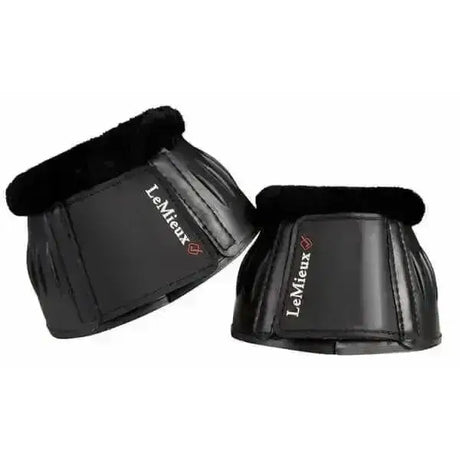 Black lemieux rubber bell overreach boots with plush fleece lining and stitched detailing for rigid protection