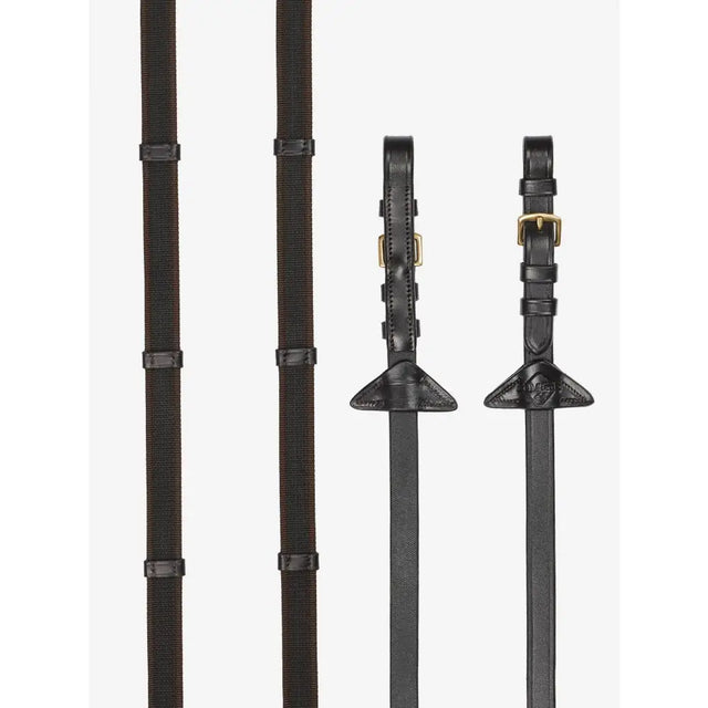 Brown brass lemieux rubber grip continental reins made of leather with brass buckles and triangular ends for riding