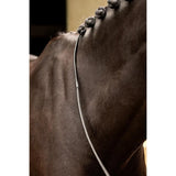 A sleek silver lemieux rubber half-lined rein strap with smooth polished finish and black lining