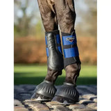 Black and blue lemieux rubber pull conventional overreach boots with padded straps for leg protection