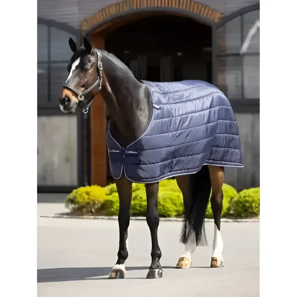 Navy blue quilted lemieux stable rugs rug liner 200g with black trim and white stitching for kudos turnout use