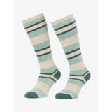 A pair of lemieux sabrina stripe fluffies knee-high socks in soft mint green cream with dark teal accents for toes toasty
