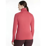 A sleek coral-pink lemieux sara snood long-sleeve base layer jacket with high collar and seamless design