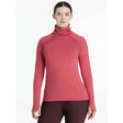 A vibrant coral lemieux sara snood long-sleeved base layer made from stretchy athletic fabric snood base layer cranberry