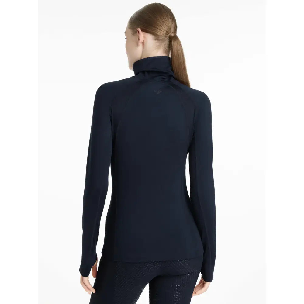 A sleek navy blue lemieux sara snood base layer with long sleeves and form-fitting smooth fabric perfect for layering