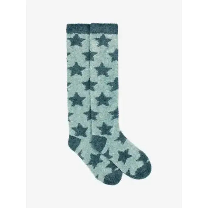 A pair of lemieux sasha star knee-high socks in light gray with dark teal star fluffies petrol patterns