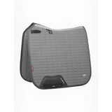 Gray quilted LeMieux self-cool dressage square polar with black trim and small logo for incredible heat pick-up and cooling effect