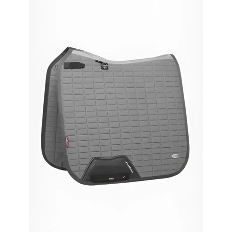 Gray quilted dressage square polar saddle pad with black trim and logo designed for incredible heat pick-up and cooling effect