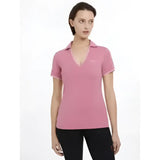 A soft pink lemieux serena sports short-sleeved polo shirt with subtle v-neck and matching collar trim