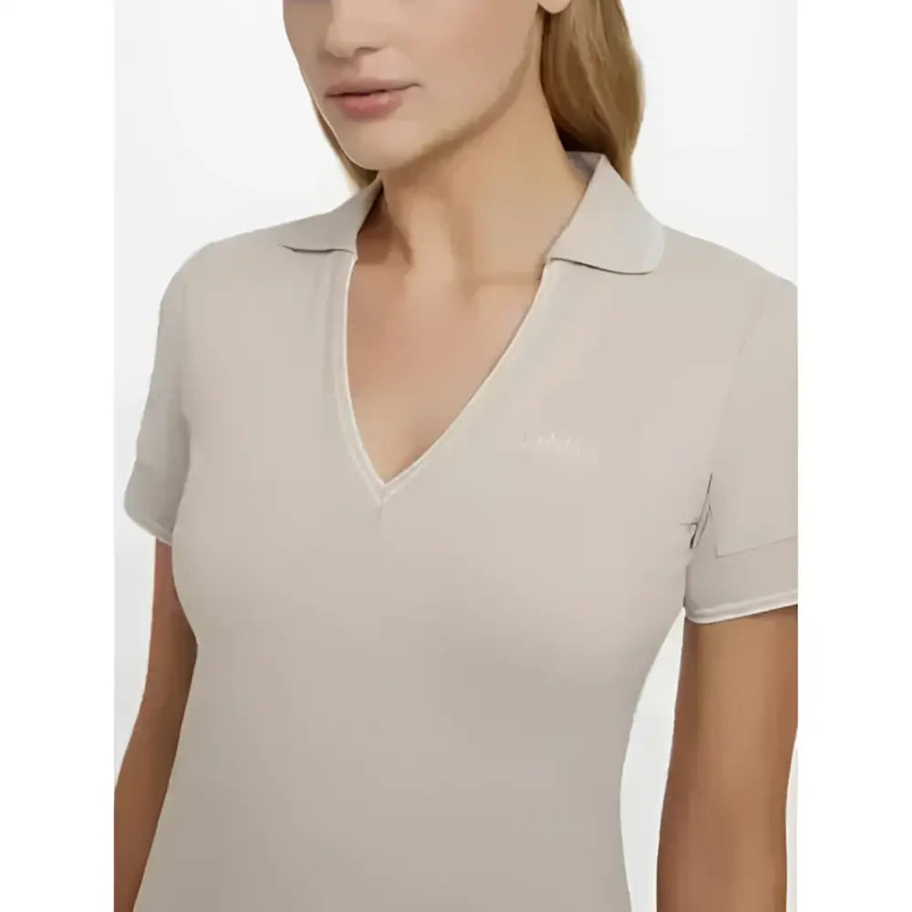 Beige lemieux serena sports polo stone with short sleeves subtle v-neckline and embroidered logo on left chest