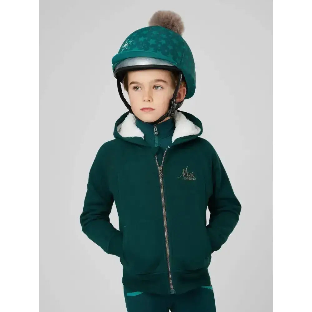 Dark green lemieux sherpa lined lily hoodie with fleece lining and silver zipper perfect for cold winter days