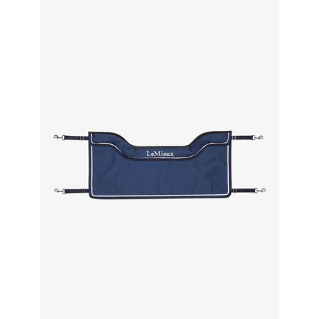 Navy blue lemieux show stable guard saddle pad with white trim and silver buckles for guard navy use