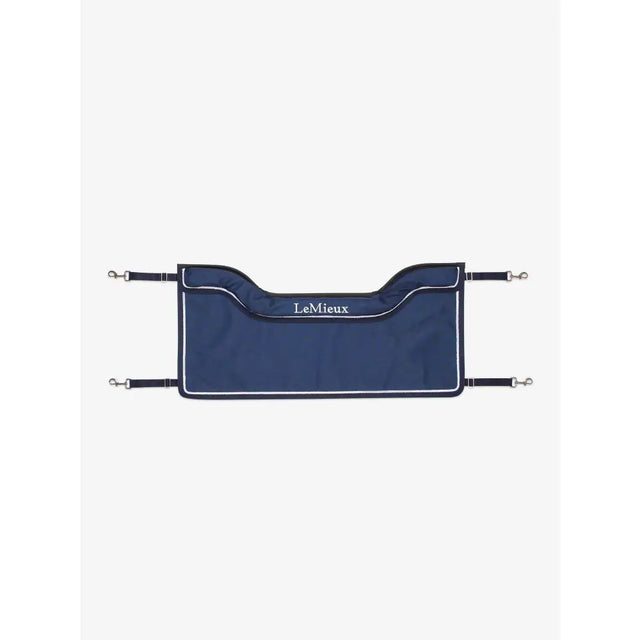 Navy blue lemieux show stable guard saddle pad with white trim and silver buckles for guard navy use