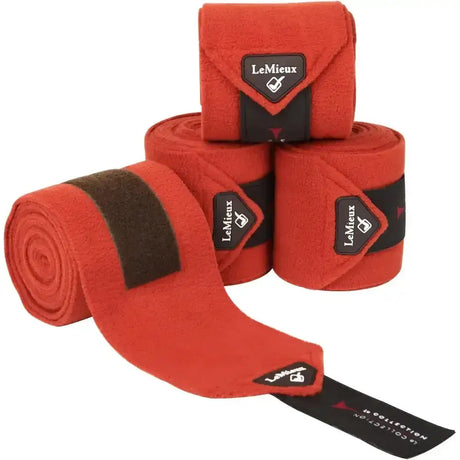 Red lemieux sienna classic polo bandages set of 4 with black accent band and brand logo for horses