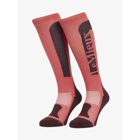 Pink and dark brown lemieux silicone socks cranberry with black mesh panel and bold levieux branding for athletic use